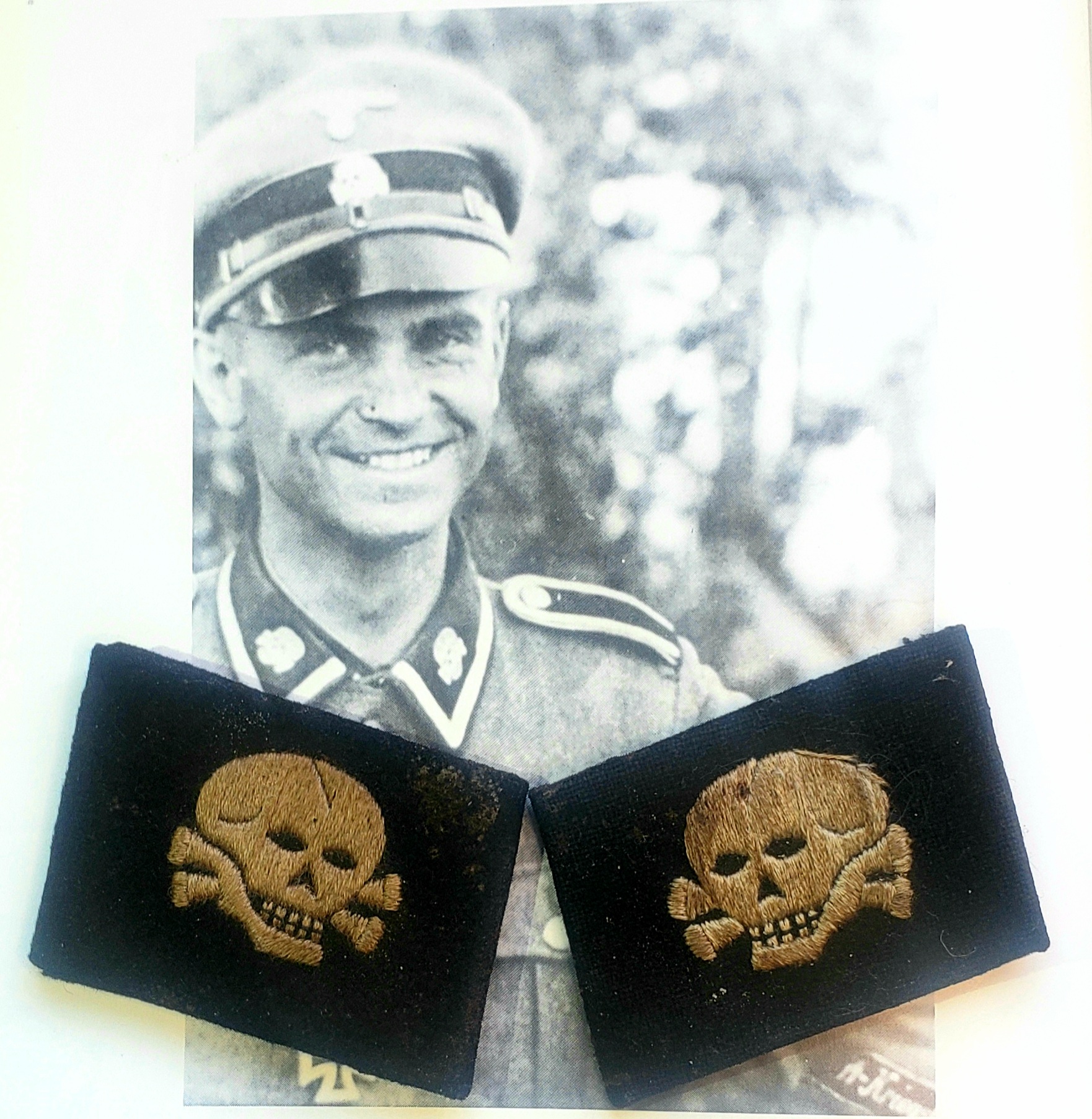 The SS- TOTENKOPF Death's Head collar tabs. 