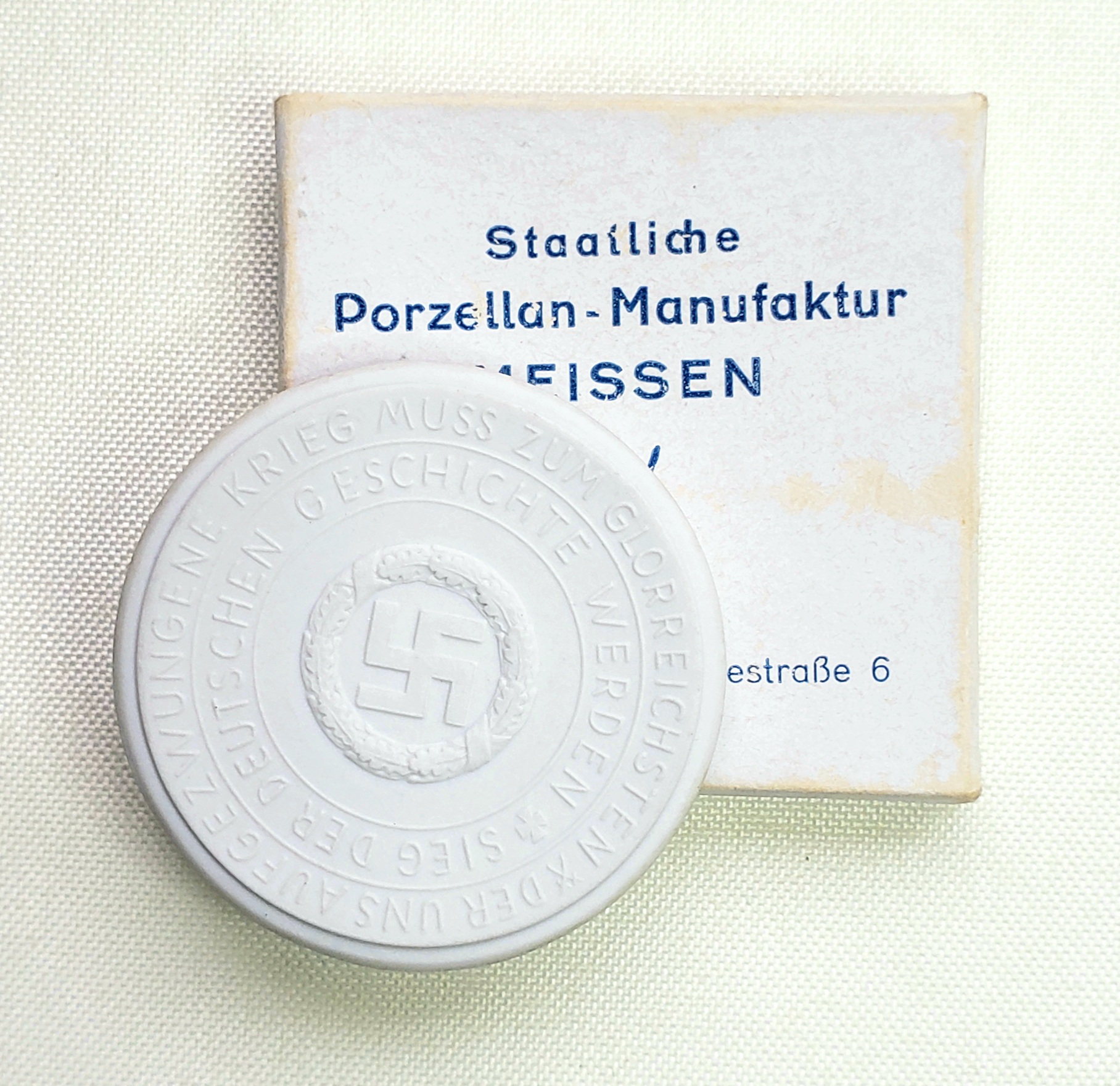 A 1940 Surrender of France Commemorative Porcelain Medallion, with case.